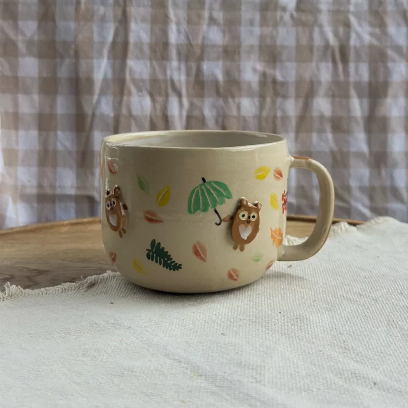 Kubek w jesienne misiaki